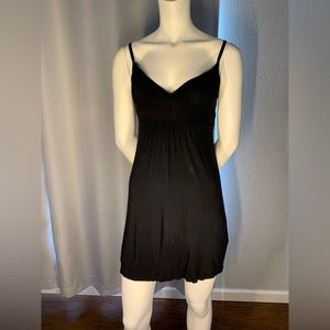 Black cotton mini dress with tie strap in back